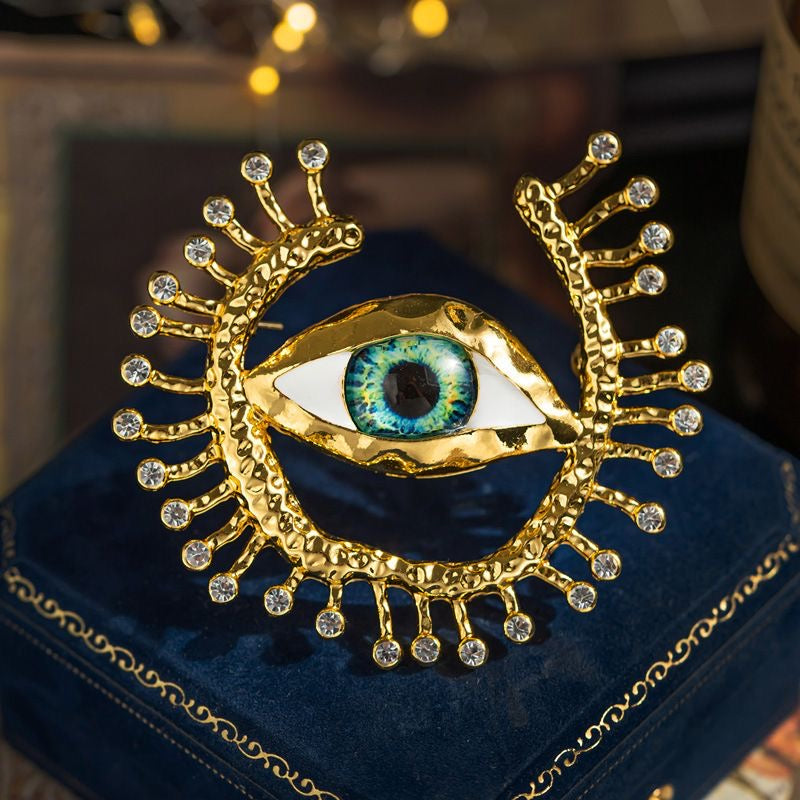 Gold Eye Brooch