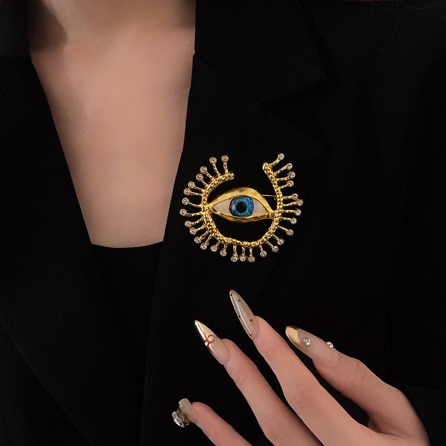 Gold Eye Brooch