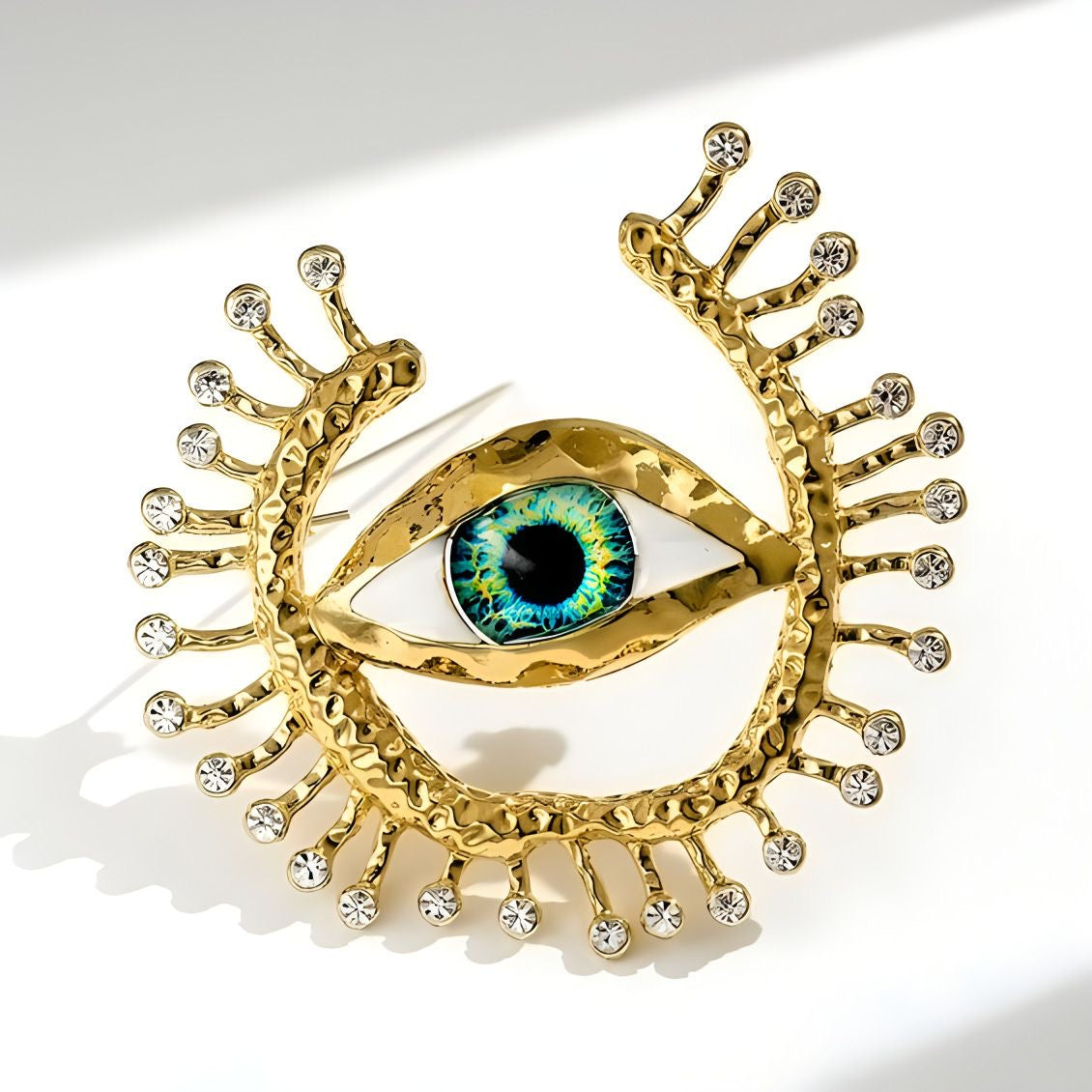 Gold Eye Brooch